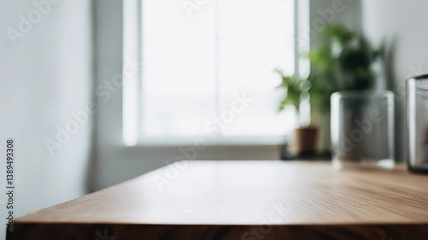 Fototapeta Close-up of an empty wooden table with a minimalist design. Simple and clean lines. The chairs at the back add depth and are perfect for product display mockups and a serene advertising atmosphere.