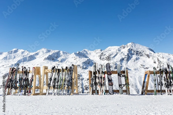 Obraz Skis on a rack outside a mountain restaurant in Obergurgl