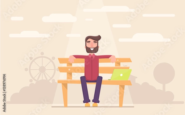 Fototapeta Freelancer happy sitting in the park taking a break at work.