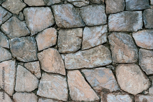 Fototapeta Stone wall texture architectural detail exterior setting natural environment close-up view visual design concept