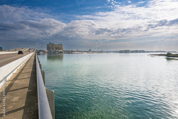 Fototapeta vehicle bridge with walking path at destin harbor