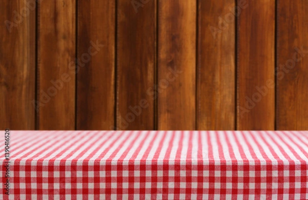Obraz Empty red and white checkered tablecloth on wooden background
