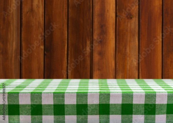 Obraz Empty green and white checkered tablecloth on wooden background