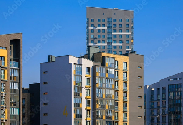 Fototapeta Cityscape, modern buildings on a summer day