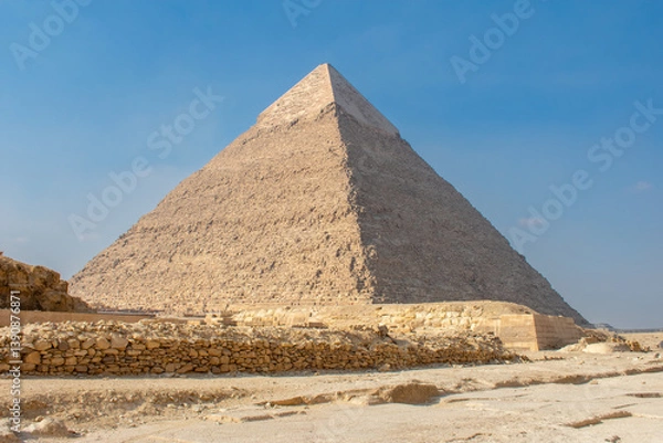 Fototapeta Great Sphinx and Great Pyramid of Cheops, Cairo, Egypt. Ancient statue of Sphinx, mythical creature with head of man and body of a lion, Giza pyramid complex (Giza Necropolis)