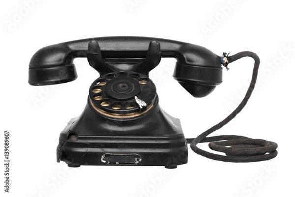 Fototapeta Старый треснутый дисковый телефон изолят на белом фоне