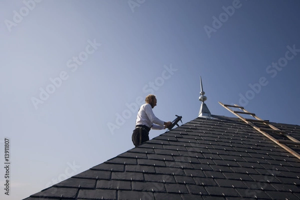 Obraz Couvreur sur le toit