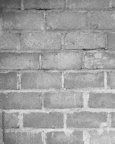 Fototapeta Close-up view of a Hebel brick wall surface, showcasing its porous texture and lightweight concrete structure