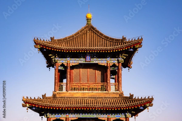 Obraz Old wall in Xian, China with traditional towers and red lanterns