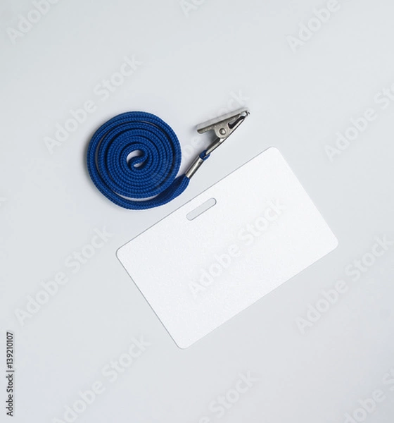 Fototapeta Lanyard and badge. Conference badge. Blank badge template in plastic holder with blue strap.