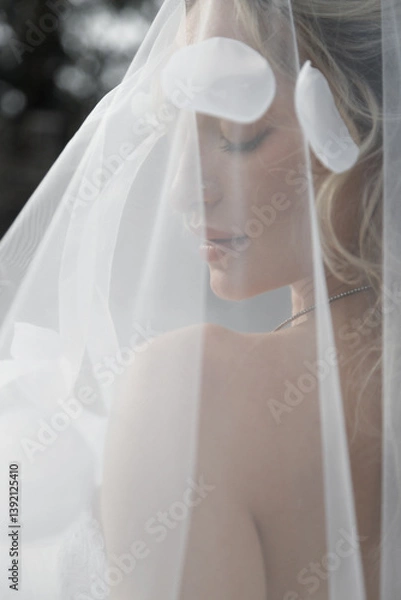 Obraz An Elegant Bride Wearing a Veil Capturing Timeless Romance and Beautiful Moments