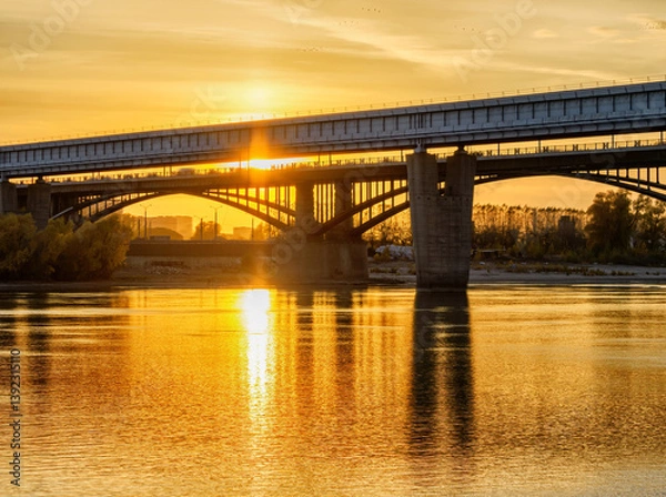 Obraz Bridges across the Ob in Novosibirsk in the golden light of sunset.