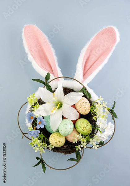 Fototapeta Easter egg basket with bunny ears