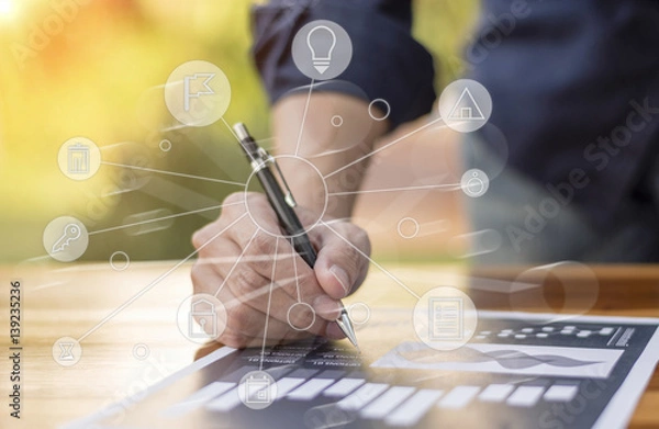 Fototapeta businessman hand working with new modern computer and business strategy as concept