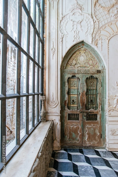 Fototapeta Intricate vintage wooden doors with decorative patterns elegant interior architectural photography cozy atmosphere close-up view