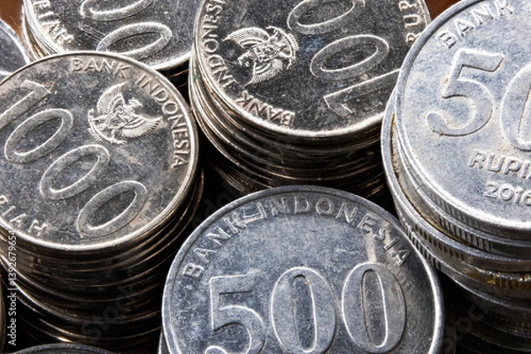 Fototapeta Macro Shot of 500, 1000, and 200 indonesian rupiah Denominations. Close-Up View for Economic Theme