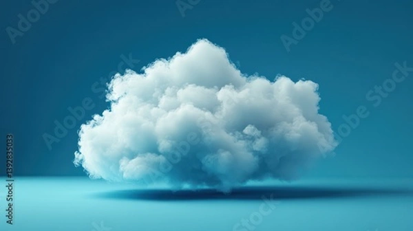 Fototapeta Single fluffy white cloud on a blue background.