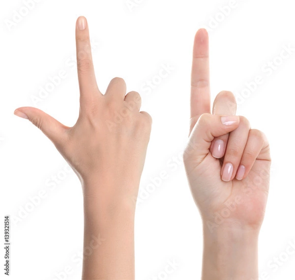 Fototapeta Woman hand pointing up with index finger or touching screen back hand side isolated on white background.