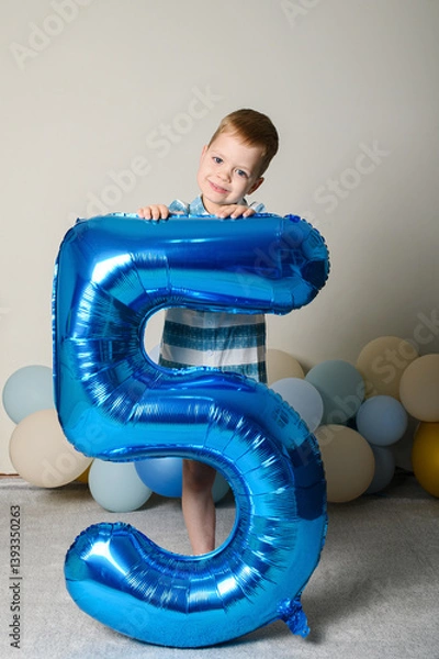 Fototapeta Happy Five Year Old Boy with Number Five Balloon