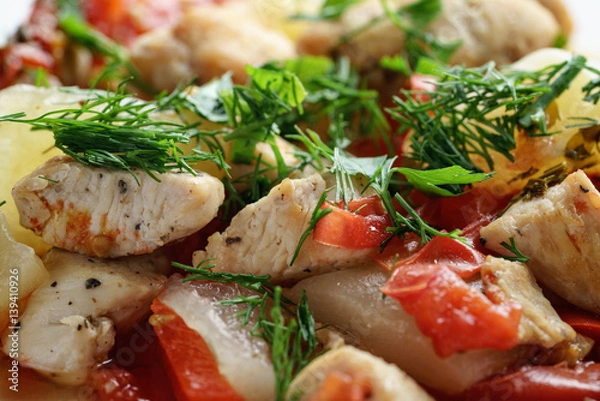 Fototapeta braised chicken fillet with squash and bell pepper, closeup photo