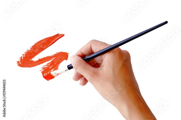 Obraz hand holds the brush against the brush stroke