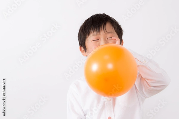 Obraz 風船を膨らます子供