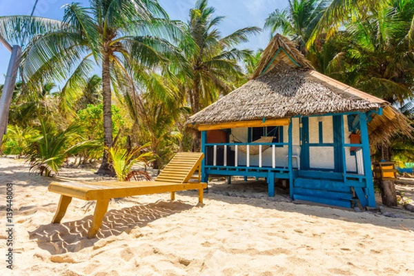 Obraz Beach chairs, clear water and beautiful view on tropical island,