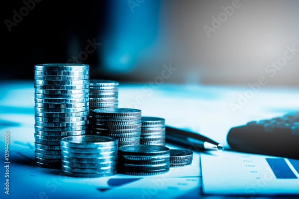 Fototapeta Row of coins,car remote and pen on account book in car finance and banking concept