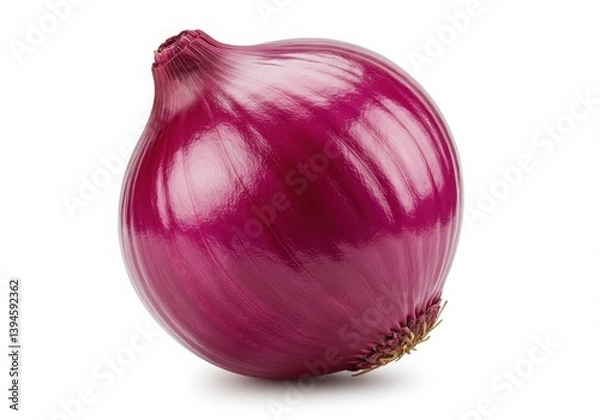 Fototapeta A single red onion with smooth skin is isolated on a white background in a studio shot close up