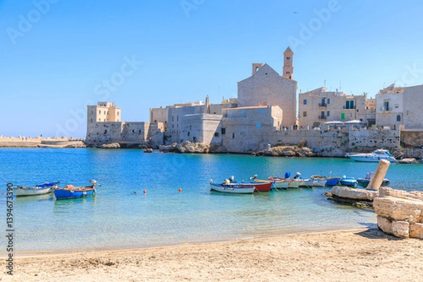 Fototapeta Giovinazzo old town in Apulia, Italy: view of the harbor from reef with the Cathedral of Santa Maria Assunta.