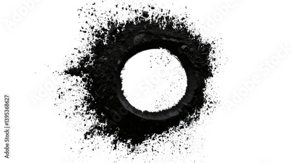 Obraz Black powder in a circular shape with a hole in the center isolated on white background