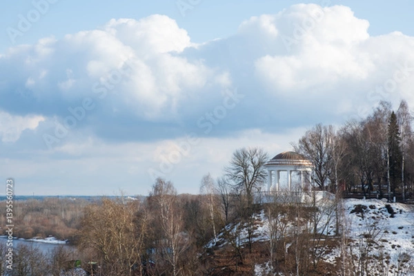 Obraz View of the rotunda on the riverbank and clouds in spring