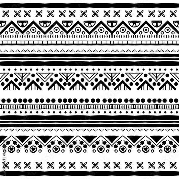 Fototapeta Black and white Ethnic seamless in native style. Vector pattern with African art decoration tribal geometric shape symbols. Folk background vector. Tent boarder backdrop. Abstract Aztec line motif