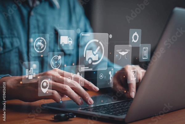 Fototapeta Person using laptop with delivery and logistics icons floating above the keyboard and touchpad