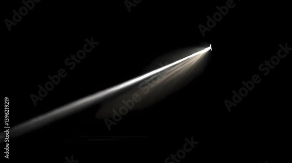 Obraz Isolated beam of light slicing through a dark space, illuminating what may be a far off object, creating a mysterious effect