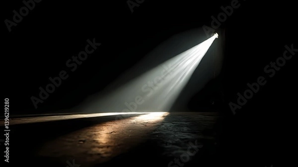 Obraz A beam of light cuts through darkness, illuminating a textured floor. The contrast highlights a sense of mystery and depth. Minimalist yet striking.