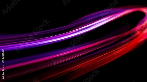Obraz A mesmerizing display of vibrant light trails dance across a deep, dark backdrop, creating a dynamic and captivating visual experience.