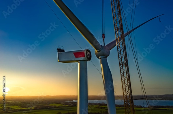 Obraz Windmühle Stern Montage bei Sonnenaufgang