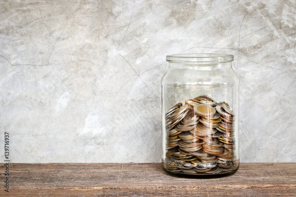 Fototapeta Słoik z monetami.