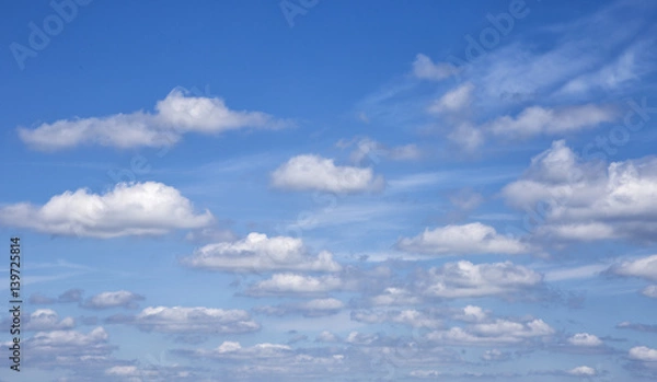 Obraz white clouds in the blue sky. Cloudy background
