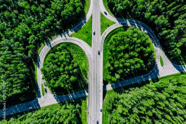 Fototapeta Aerial top down view of highway road junction with cars in Finland on a sunny summer day