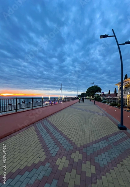 Obraz Evening embankment at sunset in Sirius Sochi