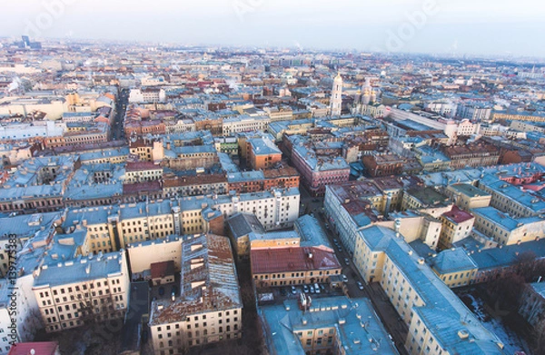 Fototapeta Beautiful super wide-angle summer aerial view of Saint-Petersburg, Russia with skyline and scenery beyond the city and Nevsky Prospect, seen from the quadrocopter air drone