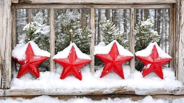Obraz Red stars covered in snow on a rustic wooden windowsill.