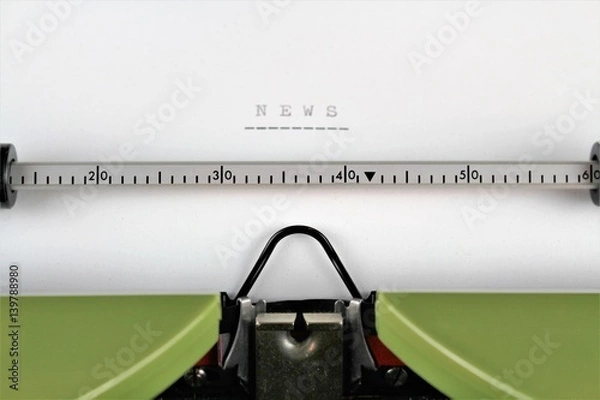Fototapeta An image of a typewriter with a news