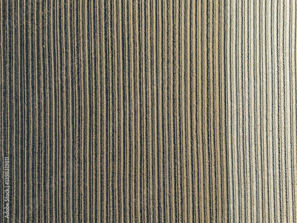 Fototapeta Aerial view of plowed fields