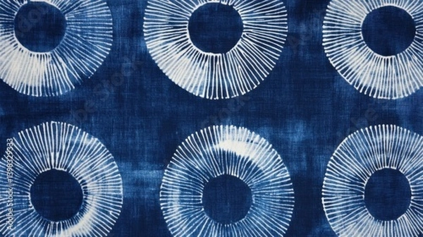 Obraz A Japanese-inspired indigo shibori fabric featuring repetitive circular motifs, perfect for traditional and modern uses