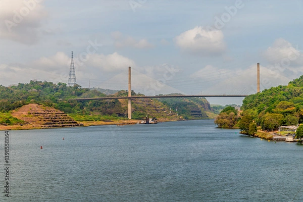 Fototapeta A view towards the Centennial Bridge from a ship navigating the Panama Canal in Panama in springtime