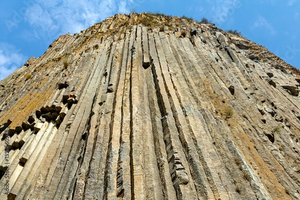 Fototapeta Steep stone mountain side wall pattern background