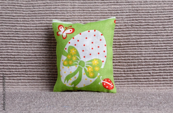 Obraz Cushion with easter egg  on sofa